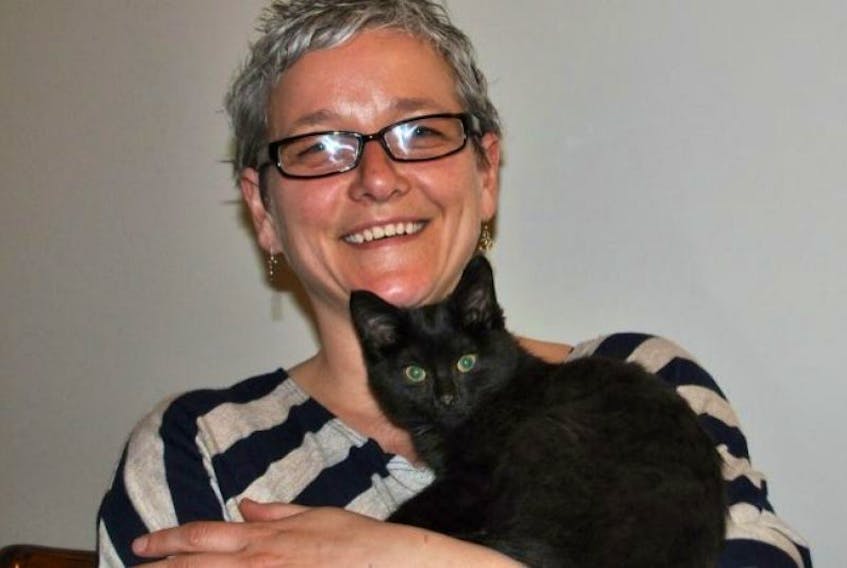 Dharma the kitten was sealed inside a backpack and left to die along the Cobequid Trail in early May. She now snuggles with Mandi Arnold, who rescued her and decided to keep her. Dharma’s nose is still healing from the scrapes it received as she attempted to escape from the bag.