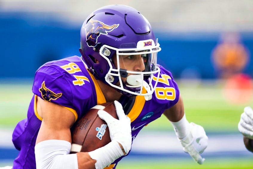 Minnesota State wide receiver Shane Zylstra (84) runs after catching a pass during the Division II championship NCAA game against West Florida on Dec. 21, 2019, in McKinney, Texas.