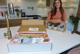 Rebekah Higgs, a.k.a. DIY Mom on Bell Fibe and YouTube, displays the miniature greenhouse fans can build with the DIY Box while raising money for worthy causes.