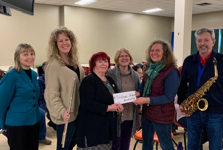 Doing their part
A cheque for $1,750 from the Second Wind Community Concert Band’s Christmas show on December 19 was presented to Every Woman’s Centre during a recent rehearsal for the “Music For Life” course. Shown here from left to right are Second Wind artistic team members Michele Xidos and Sarah MacDonald, Wanda Earhart of Every Woman’s Centre and Margaret Miles, Laura Mercer and Bruce MacKinlay, also from Second Wind’s artistic team. CONTRIBUTED
