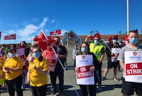Workers on strike outside the Old Placentia Road Dominion location in Mount Pearl. More than 1,400 workers are on strike at 11 locations across Newfoundland from St. John’s to Stephenville. -JUANITA MERCER/THE TELEGRAM