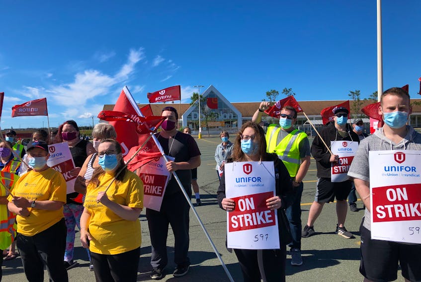 Workers on strike outside the Old Placentia Road Dominion location in Mount Pearl. More than 1,400 workers are on strike at 11 locations across Newfoundland from St. John’s to Stephenville. -JUANITA MERCER/THE TELEGRAM