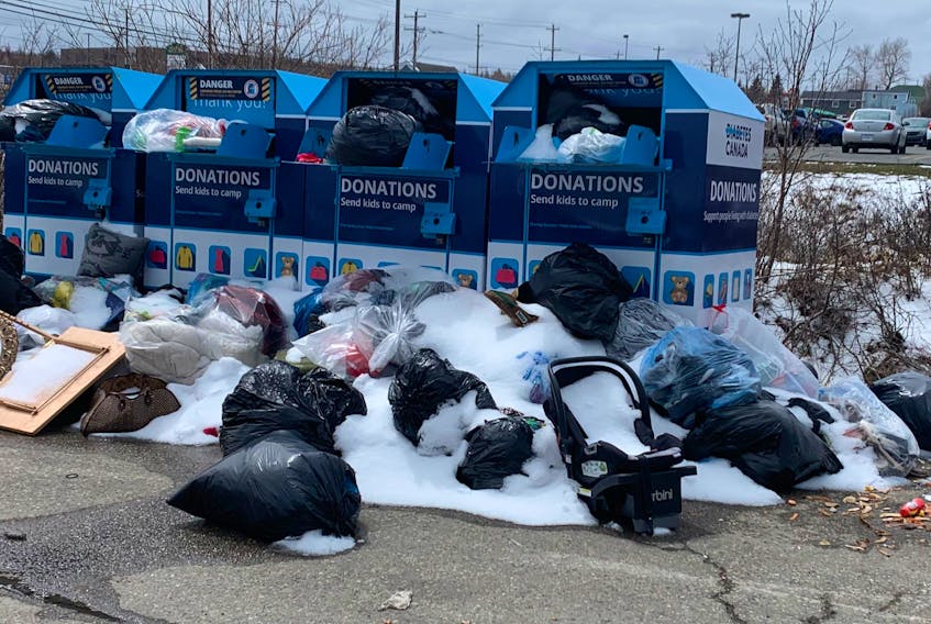Overflowing Diabetes Canada clothing drop-off bins in Glace Bay, near the Canadian Tire, infuriated Dylan Yates, the president of the Cape Breton Environment Association. He reported the mess to the Cape Breton Regional Municipality and the incident is under investigation. CONTRIBUTED/DYLAN YATES
