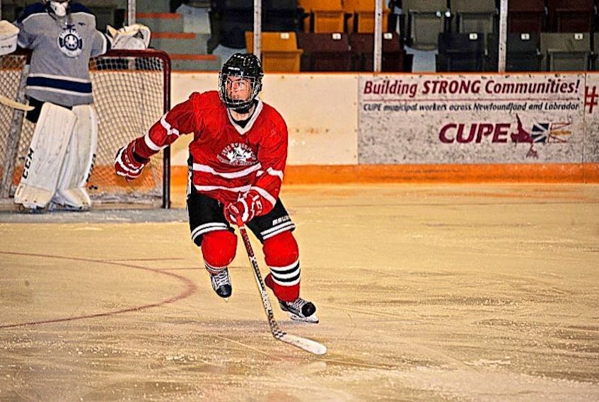<p>Donovan Rich takes part in a drill during a major midget Western Kings team practice Wednesday night at the Corner Brook Civic Centre.</p>