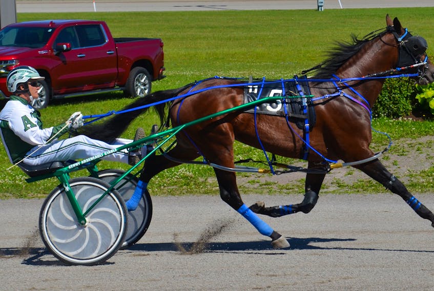 Czar Seelster and Kenny Arsenault warm up before a Governor’s Plate elimination race at Red Shores at Summerside Raceway on July 7.