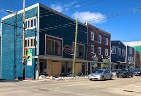 This corner of Charlotte Street might be misleading if people mistake the boarded up windows at the former Smart Shop location as an indication of a dying downtown Sydney. So far more businesses have opened in the area during the pandemic than closed. NICOLE SULLIVAN/CAPE BRETON POST 
