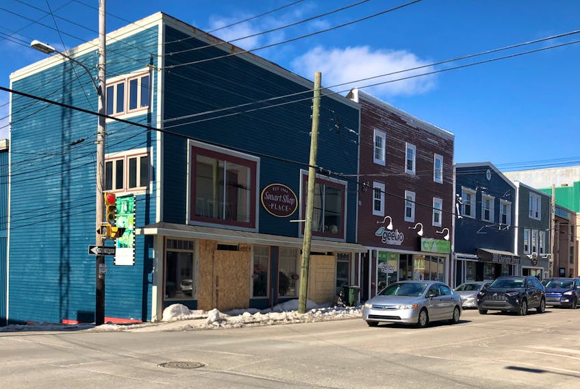 This corner of Charlotte Street might be misleading if people mistake the boarded up windows at the former Smart Shop location as an indication of a dying downtown Sydney. So far more businesses have opened in the area during the pandemic than closed. NICOLE SULLIVAN/CAPE BRETON POST 