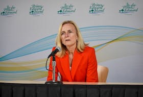 Dr. Heather Morrison, pictured here speaking at a March 27 briefing, has won the admiration of Islanders through her decisive action and calm demeanour tackling the pandemic. 