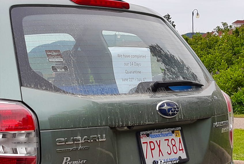 It appears visitors parked by a hiking trail in Ingonish may have heard about drama on social media regarding some concerns over licence plates outside the Atlantic bubble, or simply wanted residents to know they abided by all the public health directives. Contributed/Charlie Seymour
