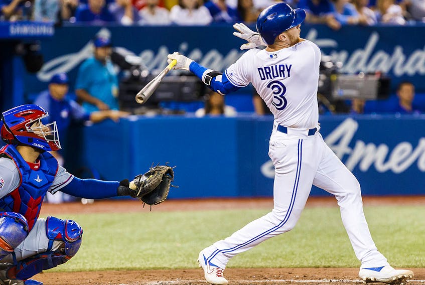 Brandon Drury of the Toronto Blue Jays hits a grand slam against the Texas Rangers in the fourth inning during their MLB game at Rogers Centre on Aug. 12, 2019 in Toronto.