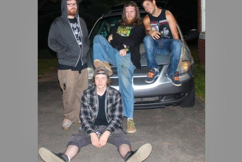 <p>Ben Banks, seated, is a member of Dumpster Mummy, which is nominated in the Loud Recording of the Year category at the East Coast Music Awards.</p>
<p>Contributed photo</p>