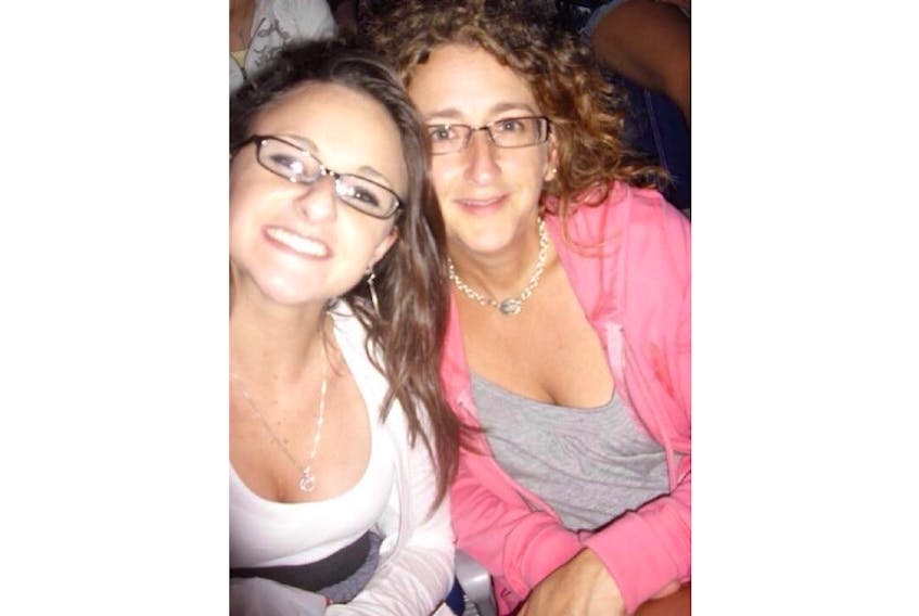 Michelle Dunn with her late daughter Alyssa at a Taylor Swift concert. Alyssa, who died at age 20 due to a heroine overdose, loved country music.