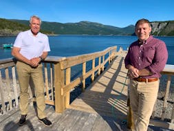 Former premier Dwight Ball (left) announced Monday he is resigning as a member of the House of Assembly for Humber-Gros Morne, so Premier Andrew Furey (right) can seek a seat in the House. - Submitted photo
