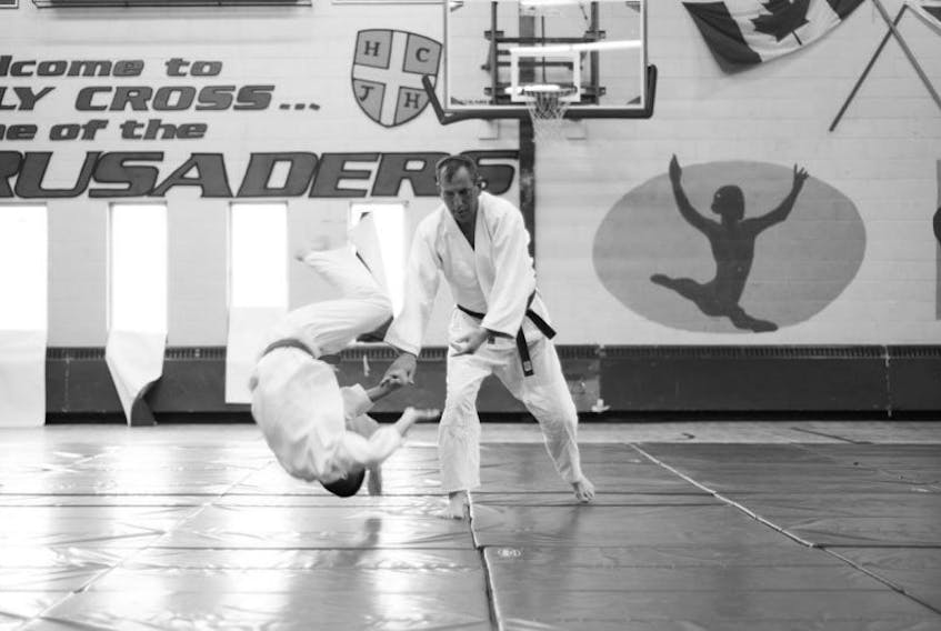 <p>Bay Roberts native Dwight Sparkes (left) is shown here during a recent belt test at his Aikido club in St. John’s. Sparkes was diagnosed with a form of vasculitis in the spring of 2014.</p>