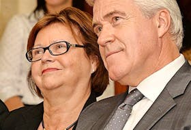<p>Premier Dwight Ball sits with federal cabinet minister Judy Foote in this file photo, taken during a funding announcement at Memorial University last year.</p>