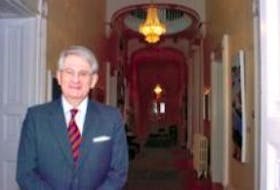 ['Lt.-Gov. Ed Roberts stands in the main hallway of Government House in St. Johns Tuesday. Today will be his last official day as the Queens representative in the province. John Crosbie will take up residence in early February. ']