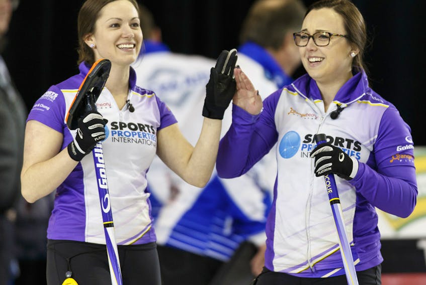 Kelsey Rocque (right) and Laura Crocker celebrate in this file photo from the Grand Slam of Curling 2016 Humpty’s Champions Cup in Sherwood Park on April 28, 2016.