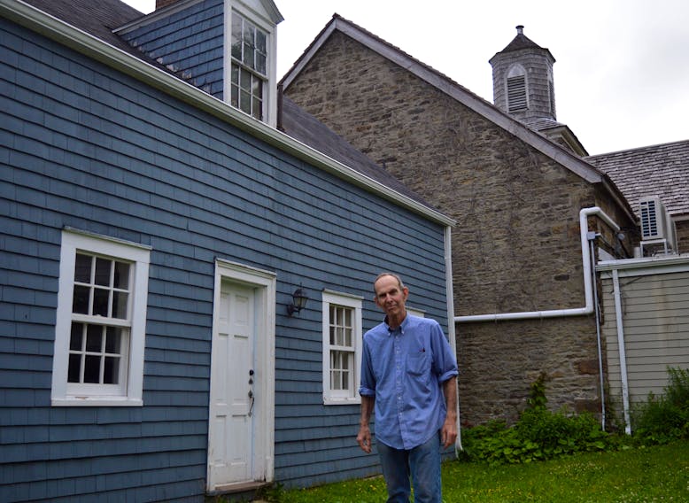 Jim MacDonald says it is with mixed emotions that he is putting the 18th-century O’Brien House up for sale. The old structure is located adjacent to the stone St. Patrick’s Church on the Esplanade in Sydney’s historic north end. DAVID JALA/CAPE BRETON POST