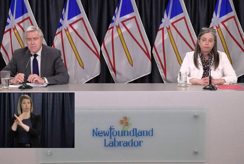 Premier Dwight Ball and Chief Medical Officer of Health Dr. Janice Fitzgerald at Friday's COVID-19 daily update. Inset image shows sign language interpreter Heather Crane. Health Minister Dr. John Haggie participated remotely. SCREEN GRAB