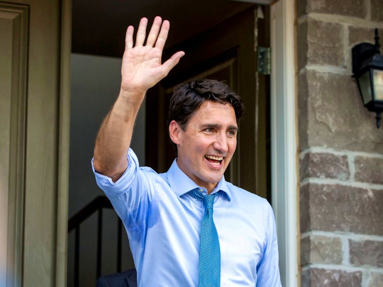 Liberal Leader Justin Trudeau waves to supporters after speaking at an election campaign stop in Brampton Sept. 22, 2019.