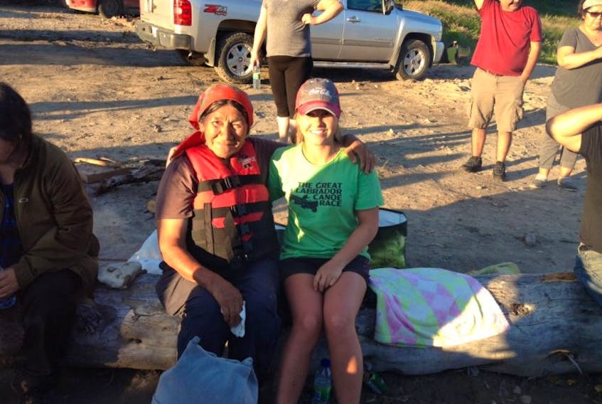 Innu elder Elizabeth Penashue poses with the youngest member of the canoe trip’s team, 16-year-old Rachel Snelgrove..