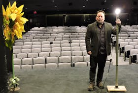 Neptune Theatre artistic director Jeremy Webb, seen here with the Fountain Hall’s “ghost light”, says the company is keeping its head above water for now, but more help will be needed from the public and the government to ensure the stage lights can come back on again when the COVID-19 pandemic subsides.