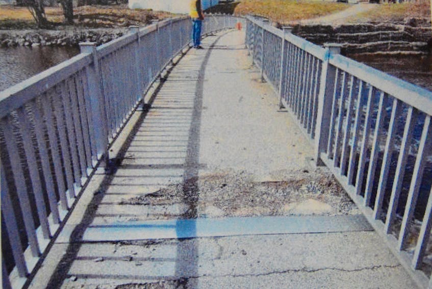 A photograph taken during the engineering study shows the deterioration of the Renwick Bridge surface. Contributed