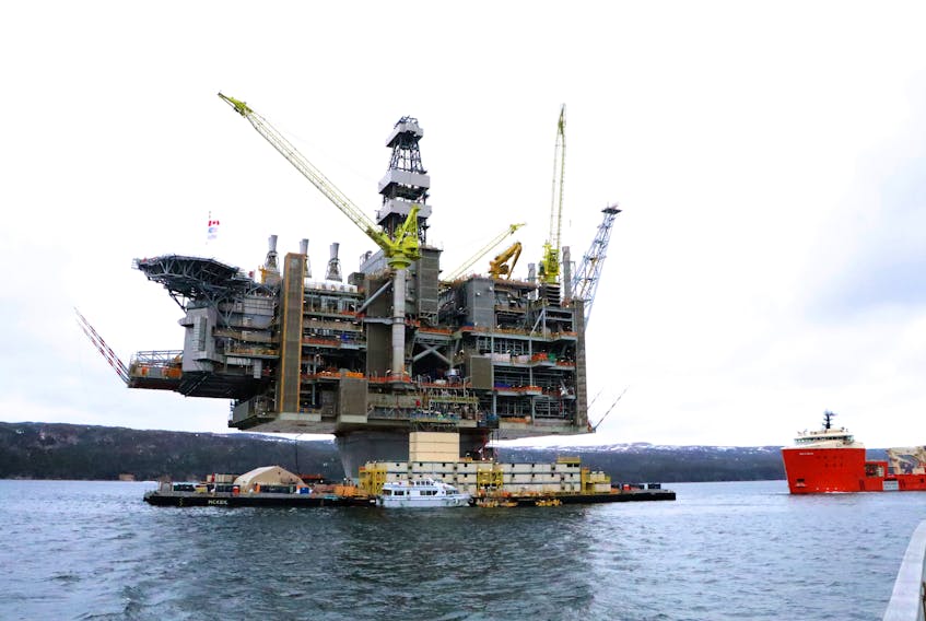 Environmental groups want the public to know that government support for the offshore industry comes on the heels of a DFO Science report that was critical of the recent regional assessment of the province’s offshore. Pictured is the Hebron platform in April 2017, prior to tow-out from the Bull Arm fabrication site. -TELEGRAM FILE PHOTO
