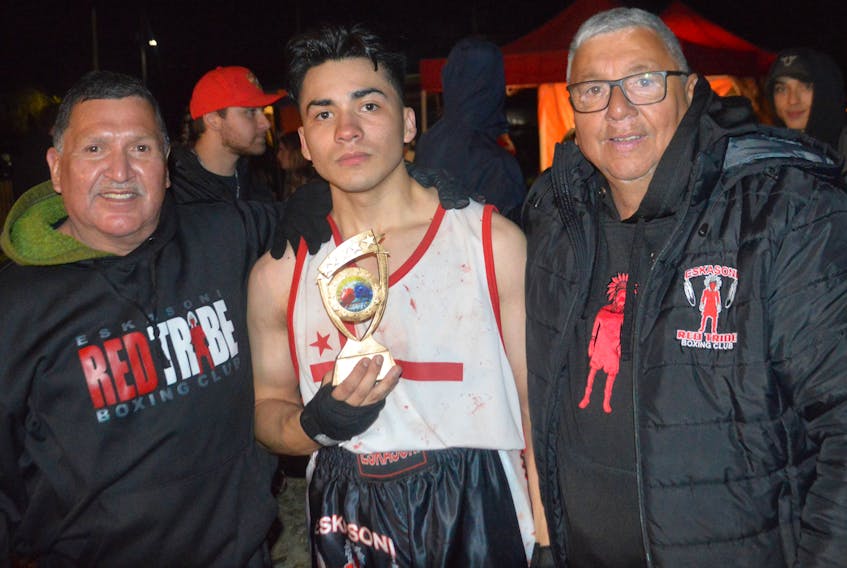 Eskasoni's Red Tribe boxing club postponed its Dec. 5 card because of the recent spike in COVID-19 cases. From left, Dale Bernard, Israel Regalado and Barry Bernard at the Lights Out boxing card in early October. OSCAR BAKER III • CAPE BRETON POST 