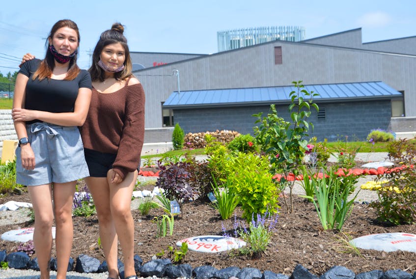 Jeannine Faye Denny, left, and Dionne Denny say they're grateful to see the foundation of the memorial garden built after years of planning. The garden is erected just outside of the Eskasoni Mental Health building. OSCAR BAKER III/CAPE BRETON POST