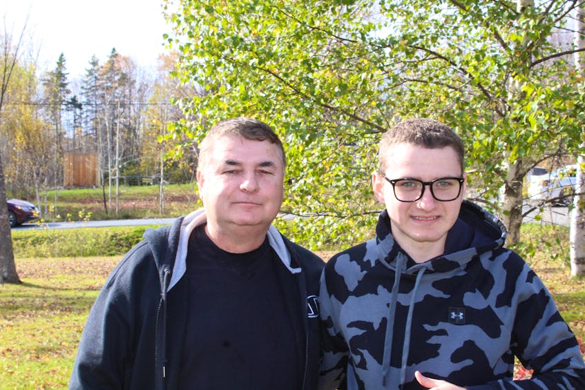 George (Tex) Marshall, left, is starting a hockey camp for kids on the autism spectrum because he says most programs are for kids younger than his son Kolton Marshall,16, right, and he wants programming for kids of all ages. Oscar Baker III/Cape Breton Post