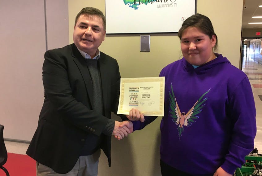 Rankin School of the Narrows student Noreen Stevens, right, is shown with Tex Marshall, president of the 2020 North American Indigenous Games. Stevens was recently named as one of eight finalists in a medal design competition for the tournament taking place July 12-18 in Halifax. CONTRIBUTED