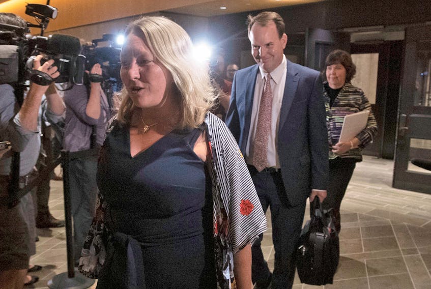  Liberal MPs Mona Fortier, Steve Mackinnon and Anita Vandenbeld head to a meeting of the House of Commons ethics committee on Parliament Hill in Ottawa, Aug. 21, 2019.
