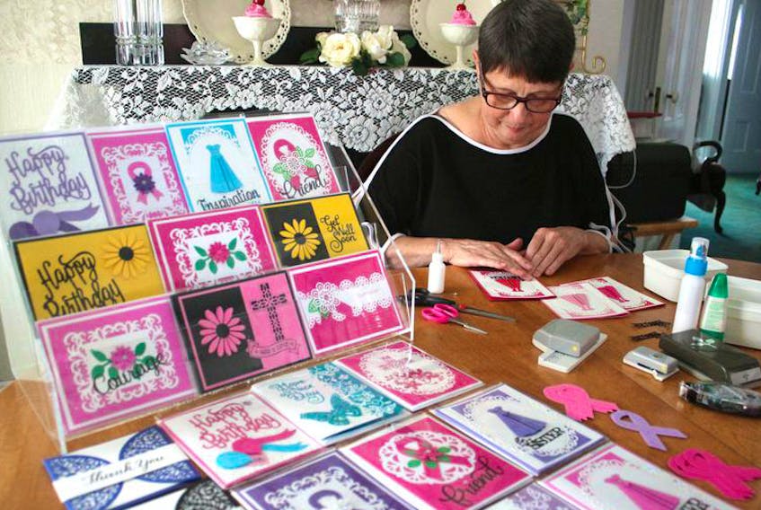 Sandy Dennis at work making Hands for Hope Cards to raise funds for the Gilles Boudreau and Friends Cancer Help Fund.