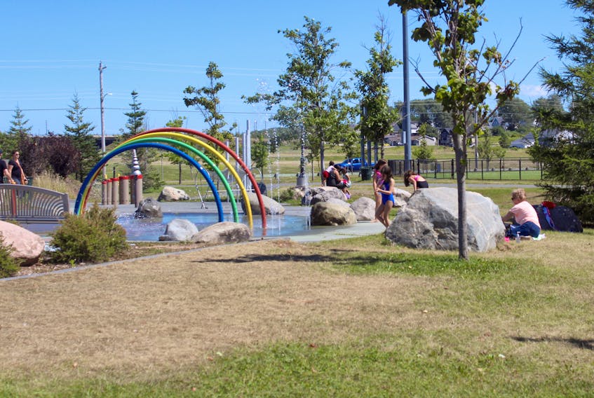 Children play at the splash pad at Open Hearth Park in Sydney on Wednesday.  Located on the site of the former  Sydney steel plant, the park also features a sports field, playground, dog park and seasonal canteen. Chris Connors/Cape Breton Post
