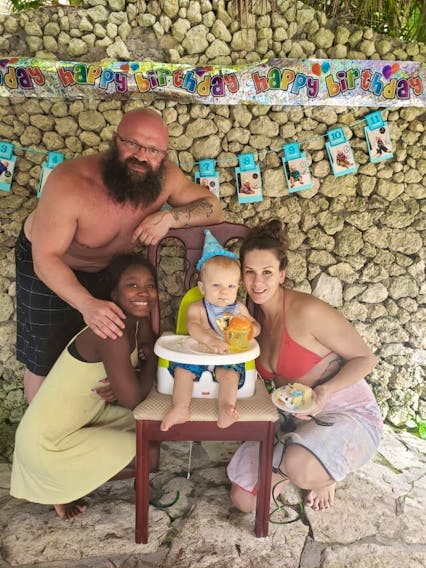 From left, St. Lunaire-Griquet native Vaden Earle, his 14-year-old daughter Widlene, son Luther Earle and wife Nikki Korpan celebrated Luther’s first birthday in Dominican Republic as a family, and with a number of Widlene’s friends. — CONTRIBUTED 