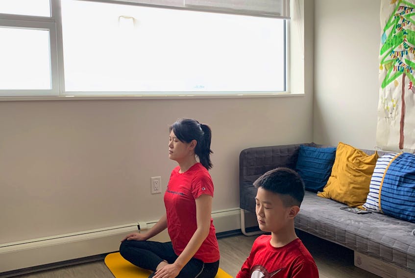 Virtual wellbeing classes have given Li flexibility to stay healthy and spend time with her son at the same time.