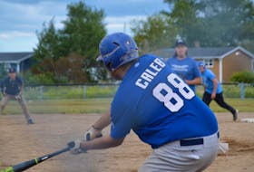 A Raider takes a swing at a Rez Sox pitch during action at a mixed fastpitch tournament held over the weekend. OSCAR BAKER III/CAPE BRETON POST