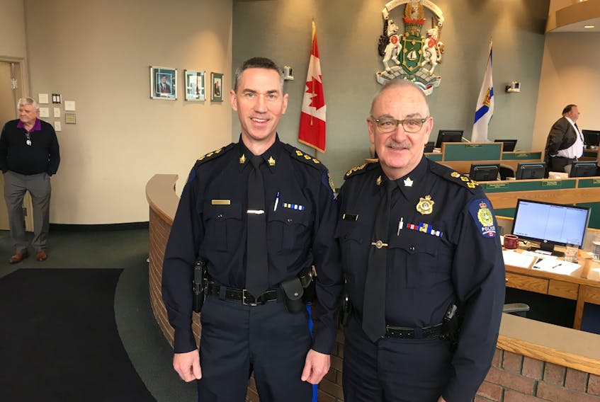 Robert Walsh, left, is the new deputy chief of the Cape Breton Regional Police Service. He's shown in CBRM council chambers with Police Chief Peter McIsaac.
