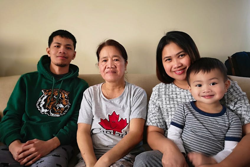 Jerick, Leonora, Renleth and Terence Laurel. Their family in the Philippines owned a restaurant right next to the Taal volcano, which erupted last Sunday. Andrew Waterman/The Telegram