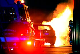 Firefighters were called to multi-vehicle fire that destroyed three vehicles and damaged a fourth early Monday morning. Keith Gosse/The Telegram