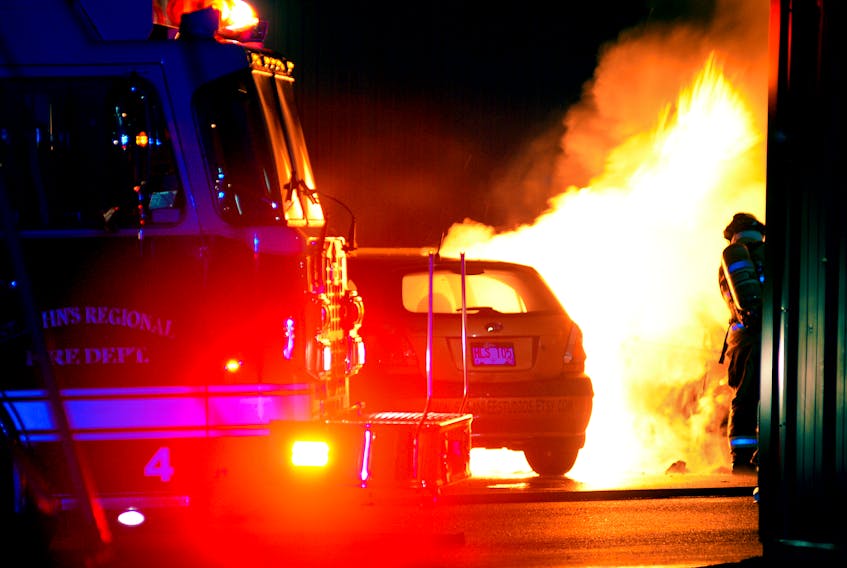 Firefighters were called to multi-vehicle fire that destroyed three vehicles and damaged a fourth early Monday morning. Keith Gosse/The Telegram