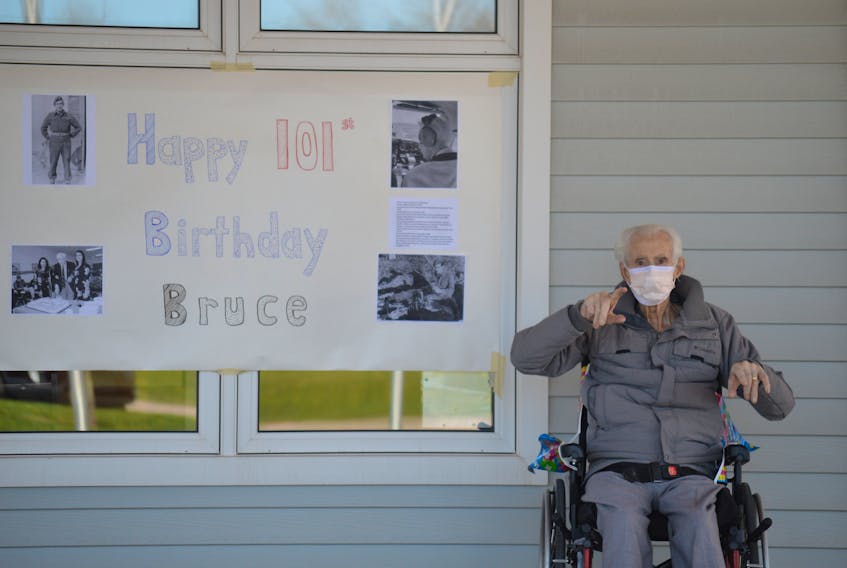 Second World War veteran Bruce Coulson waves to family and friends who showed up to celebrate his 101st birthday at the Prince Edward Home in Charlottetown on Monday. 