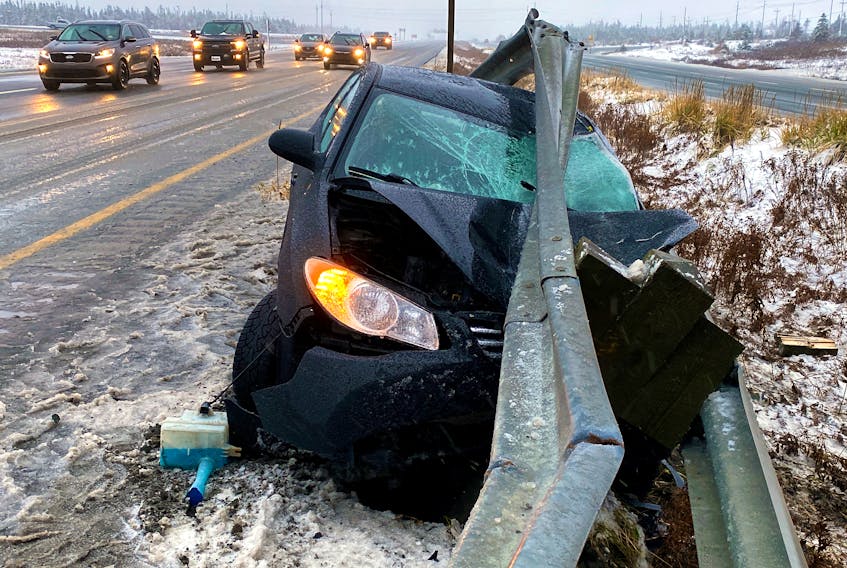 One man was lucky to escape serious injury when his car struck a guardrail at the cloverleaf just outside Mount Pearl. Keith Gosse/The Telegram