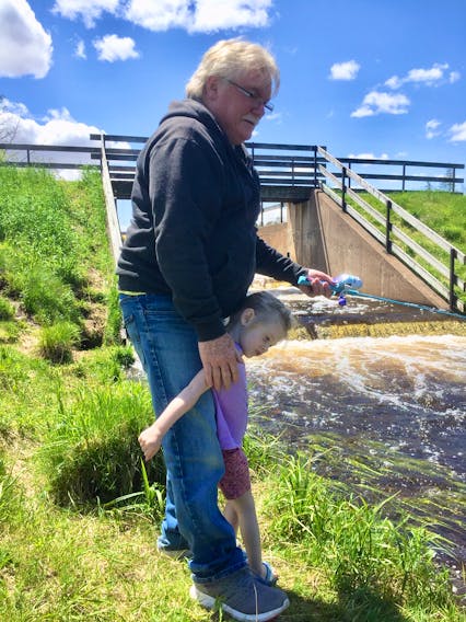 Doug Barkhouse and his three-year-old granddaughter Madison Barkhouse are shown fishing at MacElmons Pond Provincial Park in Debert last weekend. Contributed