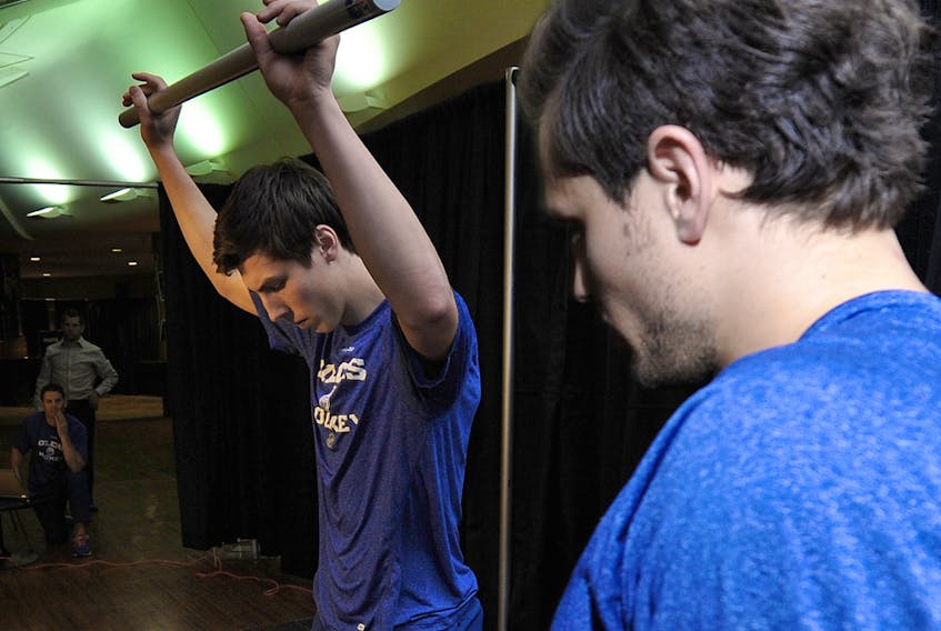 Edmonton Oilers forward Ryan Nugent-Hopkins undergoes fitness testing with team trainer Chad Drummond in this file photo from Rexall Place on Jan.13, 2013.