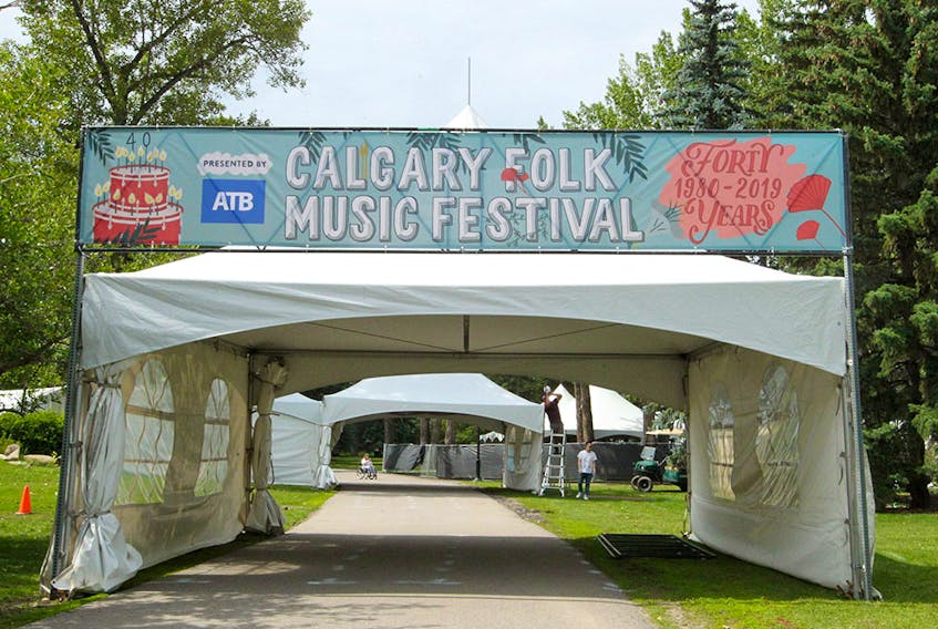  Crews are seen setting up for the 40th Calgary Folk Music Festival in Prince’s Island Park on Monday, July 22, 2019. 