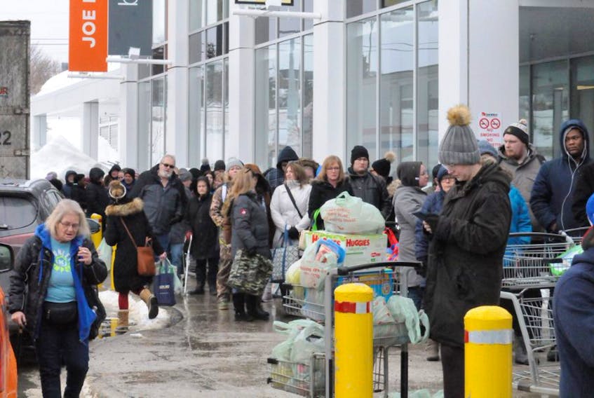 There were long line-ups waiting to get inside the Dominion store on Blackmarsh Road in St. John’s on Tuesday after officials lifted the state of emergency. Joe Gibbons/The Telegram