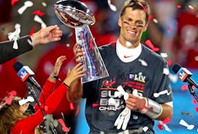 Quarterback Tom Brady won his record seventh Super Bowl Sunday night and was named MVP for the fifth time when he led the Tampa Bay Buccaneers to a 31-9 victory over the Kansas City Chiefs.
