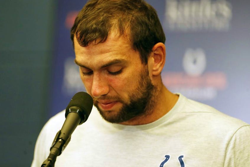Indianapolis Colts quarterback Andrew Luck announces his retirement in a press conference after the game against the Chicago Bears at Lucas Oil Stadium on Aug 24, 2019.